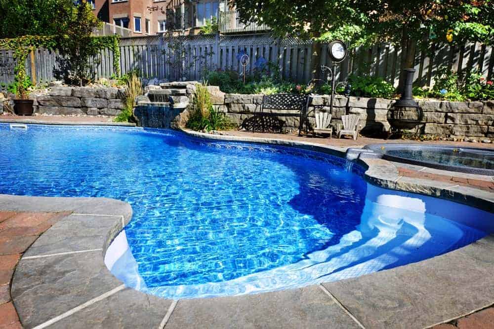 In-Ground Pool Service Completing Pool Maintenance